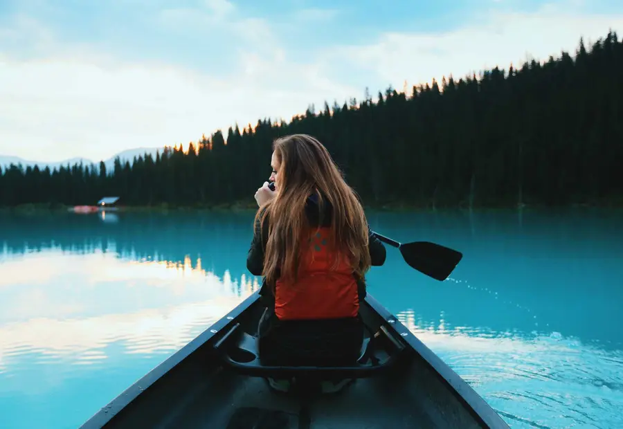 Woman in a kayak on a lake